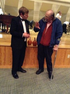 Tim and composer Elliott Schwartz talk after a Casco Bay Wind Symphony concert which included works by both.